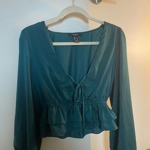 Size medium dark green long sleeve silk top!!! Slightly worn!